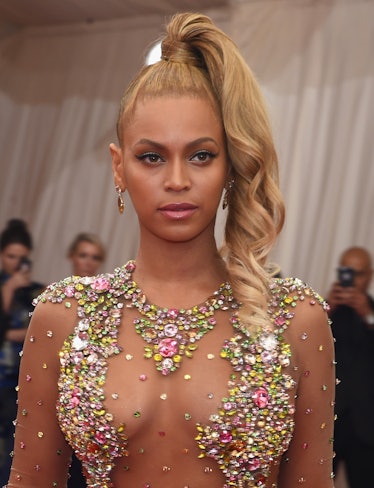 Beyoncé in a sheer gown with multicolored beads at the Met Gala