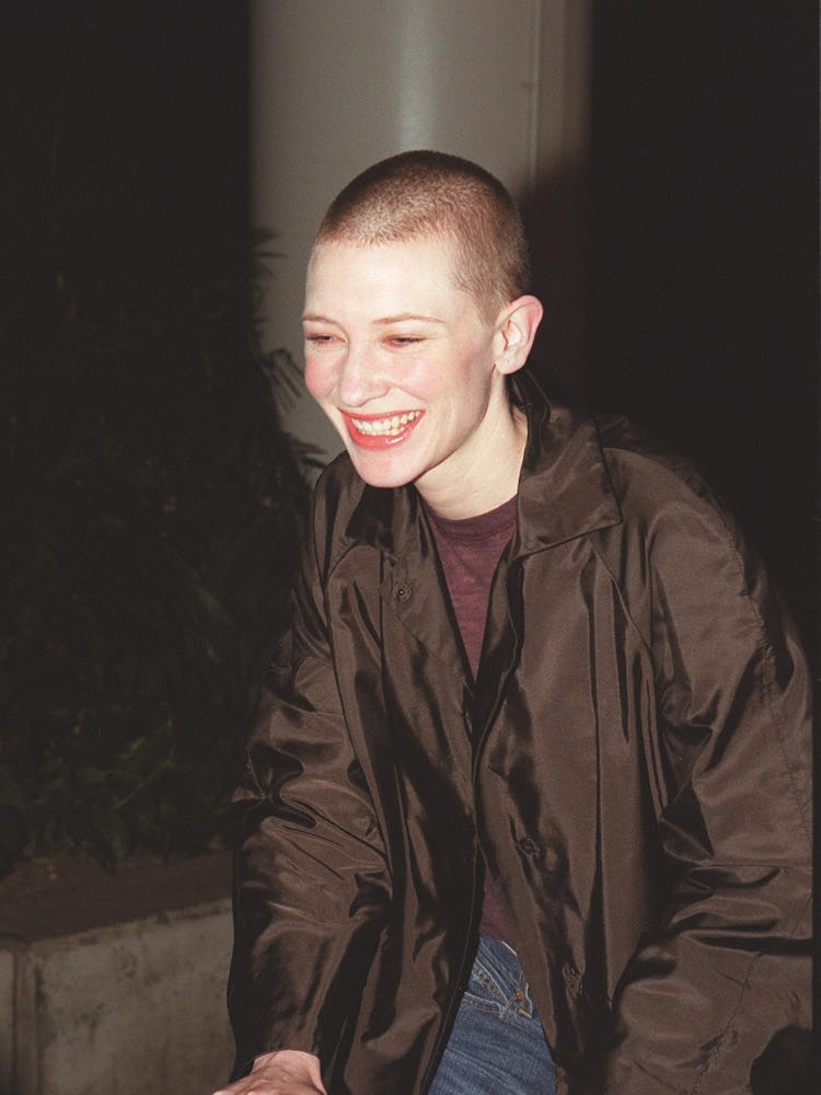 Cate Blanchett with a buzz haircut in a brown jacket in the movie 'Heaven'