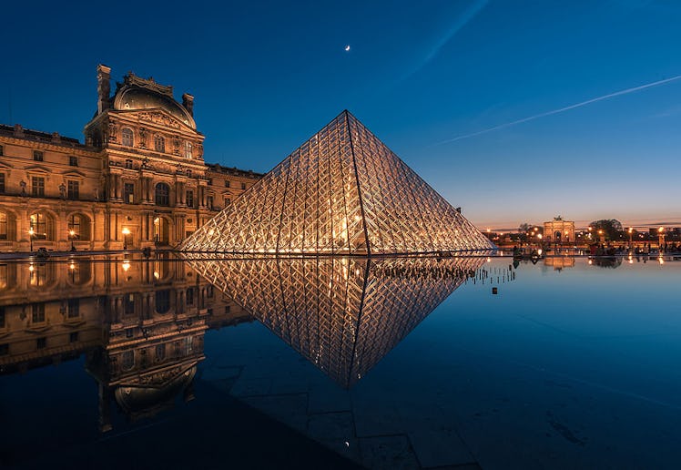 Pyramid at Louvre Museum with The Moon