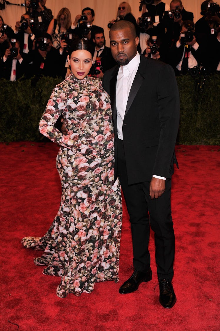 Kim Kardashian and Kanye West at the 2013 Met Gala Punk: Chaos to Couture. 