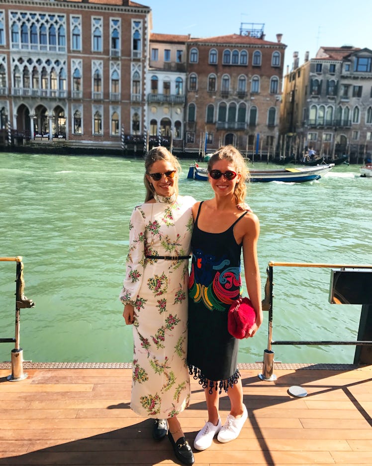  Colby Mugrabi and  Eugenie Niarchos posing and smiling in Venice