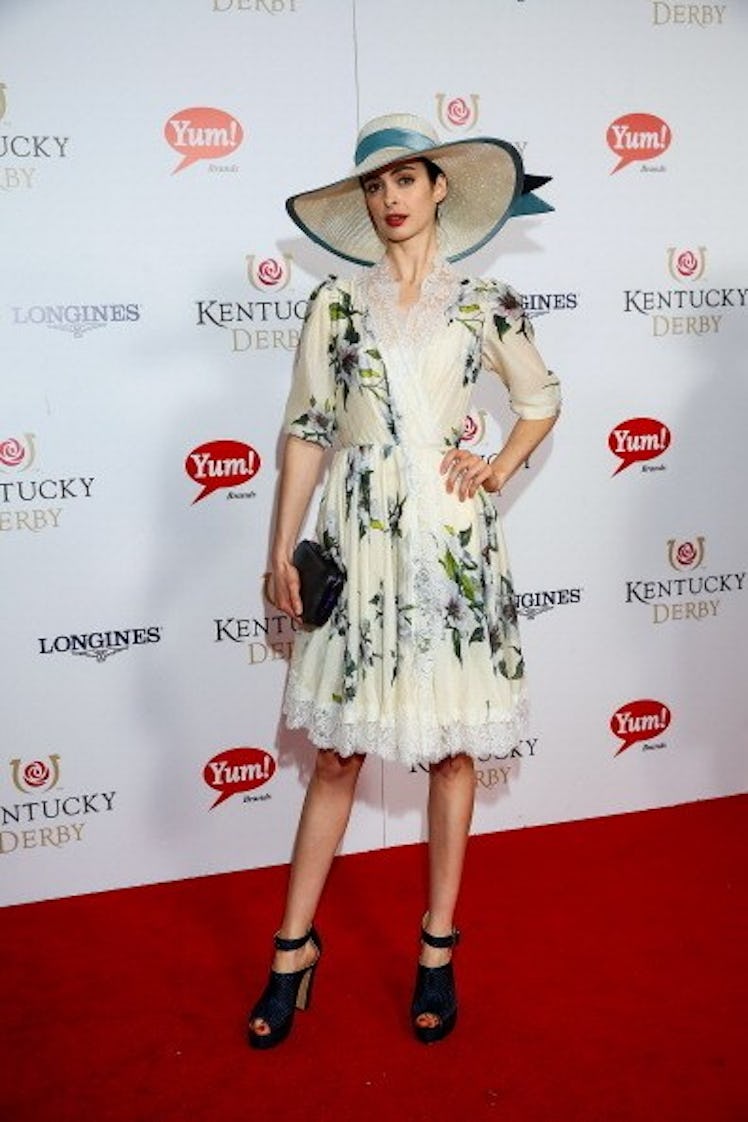 Krysten Ritter in a white-green floral dress at the Kentucky Derby in 2010.