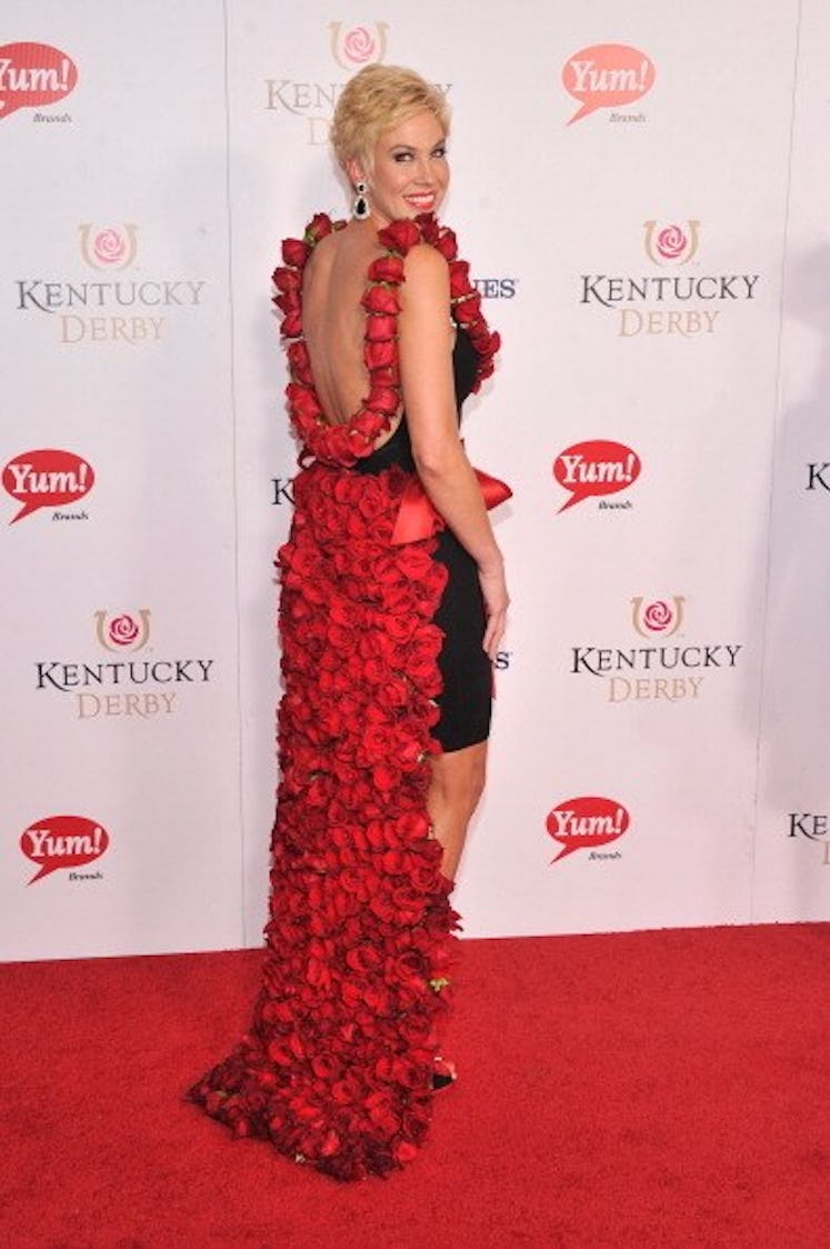 Shannon Voss referenced in a red floral 3D print dress at the Kentucky Derby in 2013.
