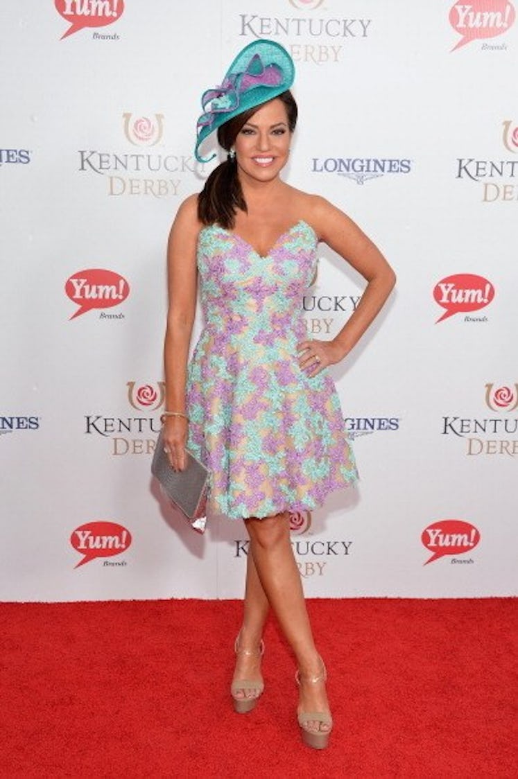 Robin Meade in a pastel green and lilac floral dress and teal hat at the Kentucky Derby in 2014.