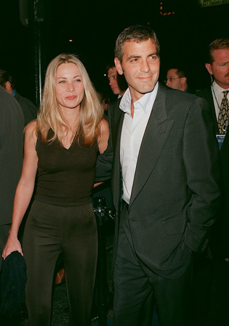 Celine Balitran and George Clooney at a red carpet premiere