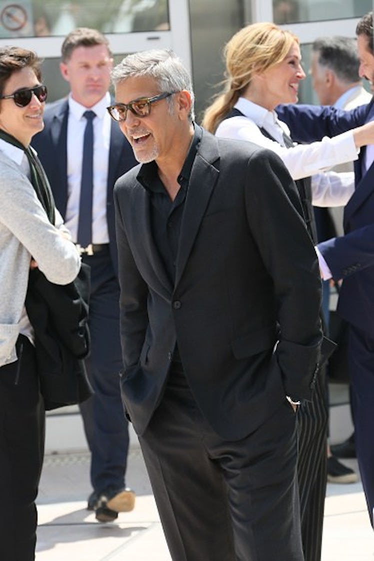George Clooney wearing a black suit