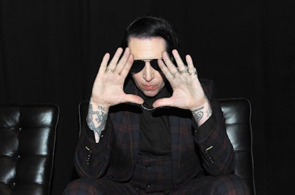 Marilyn Manson and Father Wear Matching Makeup
