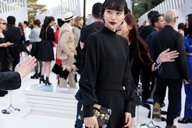 Who on the front row at the Louis Vuitton cruise 2018 show in Kyoto?