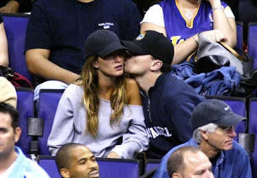 Leo and Giselle kissing. 