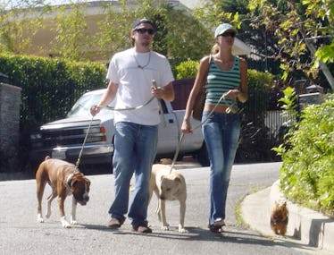 Everybody Leonardo DiCaprio Has Publicly Dated: A Photographic Information 3 Gisele and Leonardo with dogs.