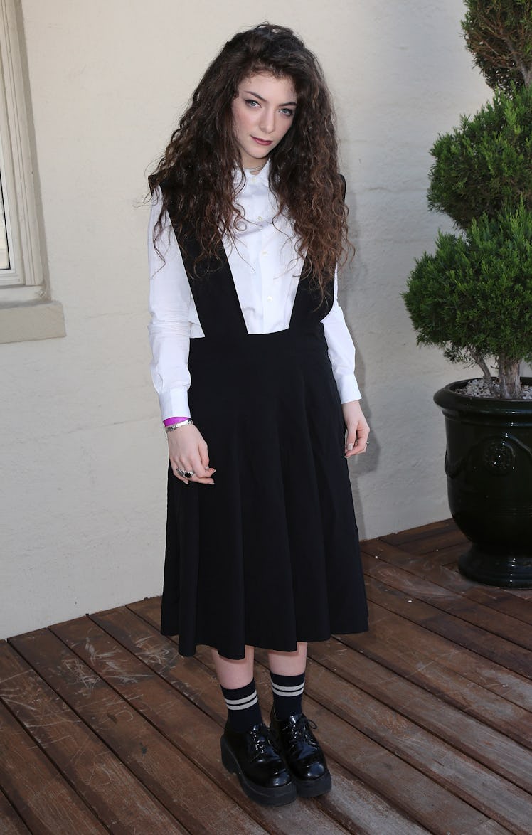 Lorde poses prior to performing at 98.7 FM’s Penthouse Party Pad at the Historic Hollywood Tower on ...