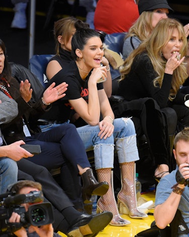 Kylie Jenner, Travis Scott Sit Courtside at Basketball Game: Photos