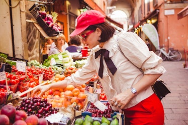 Soko buying fruits in the streets of Bologna