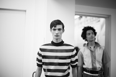 A model in a striped top and a model in a jacket at the Prada Spring/Summer 2017 show