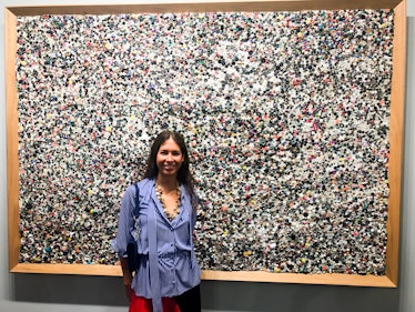 Colby Jordan posing next to the Memory Ware Flat masterpiece by the late Mike Kelley