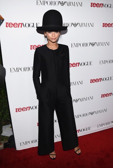 Zendaya wearing a big black hat 