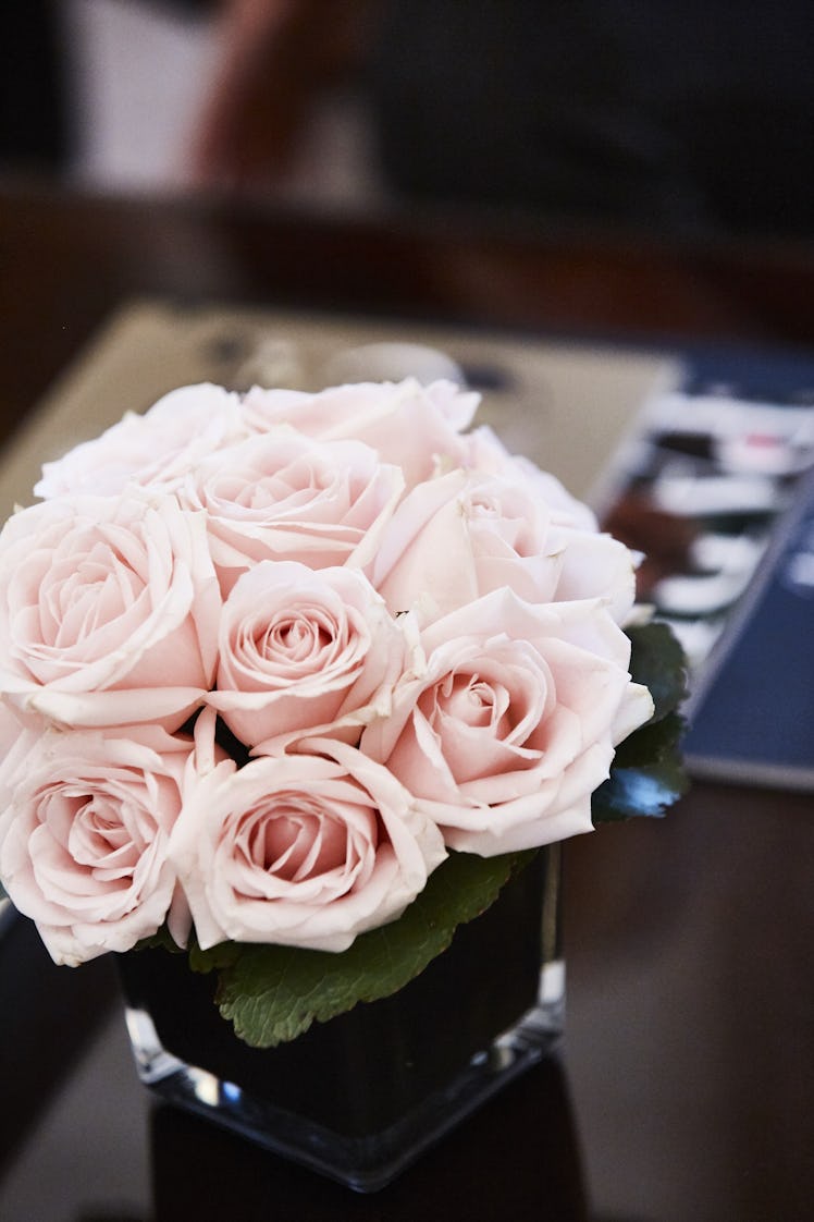 A bouquet of pink roses in Tracee Ellis Ross's room