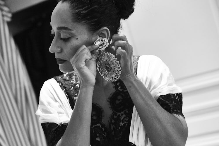 Tracee Ellis Ross putting her earrings before Rodarte's Paris show