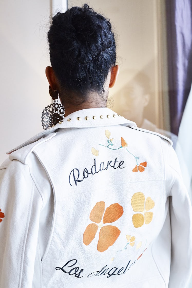 Tracee Ellis Ross wearing a white Rodarte leather jacket for their Paris show