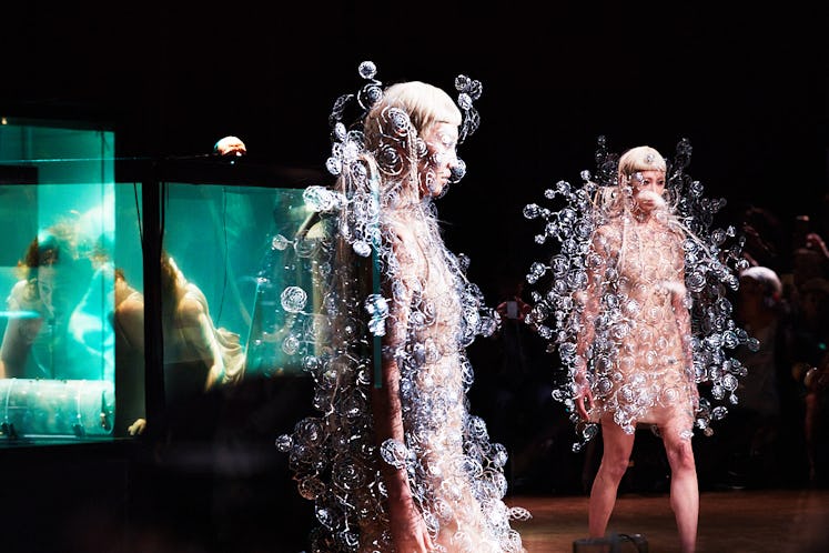 Two models wearing bubble dresses at the Iris Van Herpen's 10th Anniversary Fashion Show