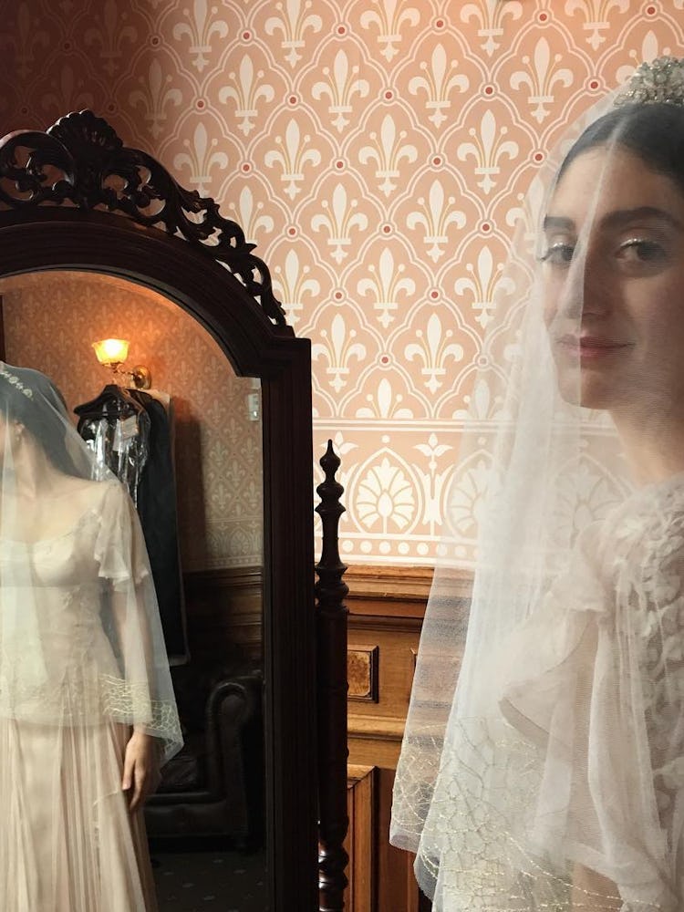  Arden Wohl in her antique-looking wedding dress.