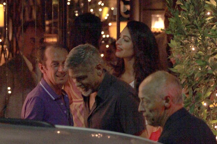 George and Amal Clooney spotted out with friends at Gatto Nero Restaurant in Milan