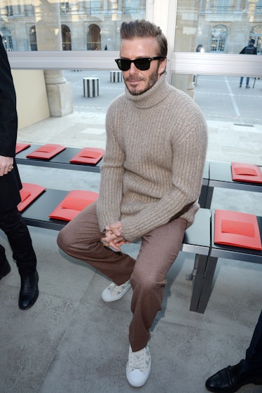 A Visual History of Male Celebrities Enjoying Fashion Shows, From ...