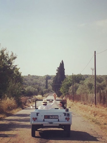 Lucilla Bonaccorsi and Filippo Richeri, driving off after their wedding in Sicily.