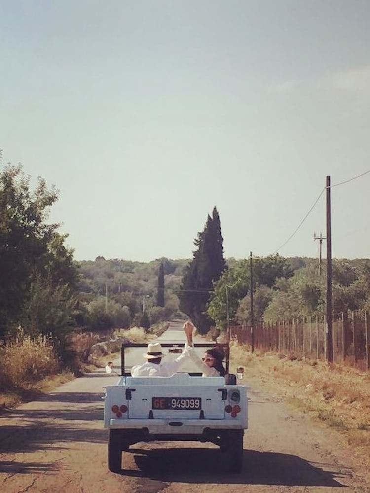 Lucilla Bonaccorsi and Filippo Richeri, driving off after their wedding in Sicily.