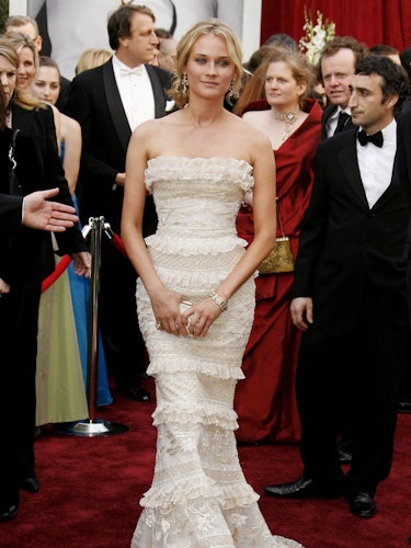 Diane Kruger in a white lace off-the-shoulder dress at the The 78th Annual Academy Awards
