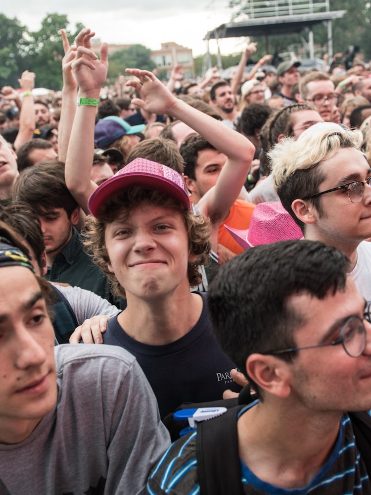 A large crowd smiling at the Pitchfork Music Festival