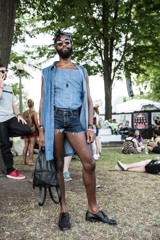 A Pitchfork Music Festival attendee in a denim top and shirt and denim shorts