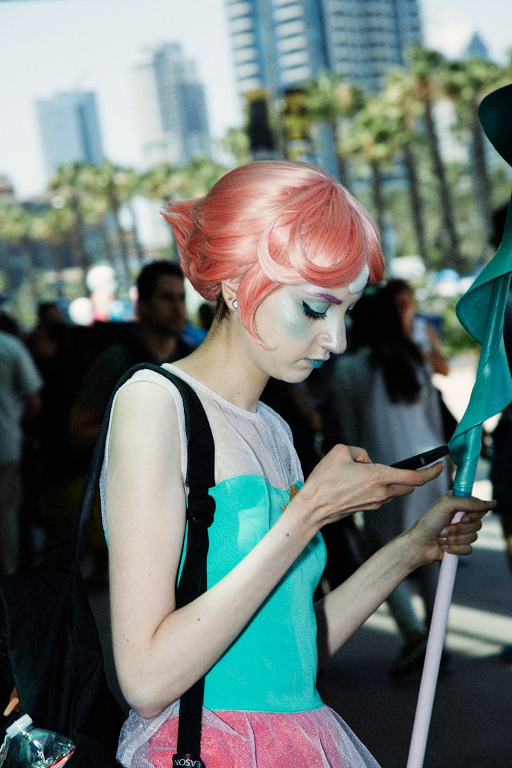 A woman wearing a costume at the 2017 Comic-Con International, held in San Diego