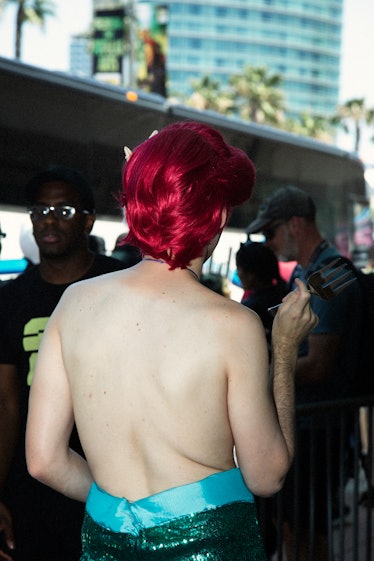 A person wearing a topless costume at the 2017 Comic-Con International, held in San Diego