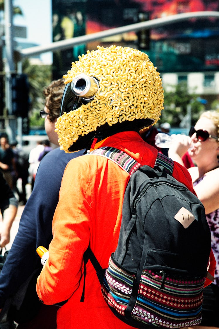 A person wearing a yellow helmet at the 2017 Comic-Con International, held in San Diego