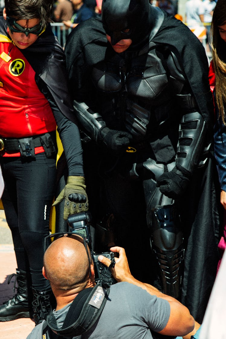 Visitors wearing Batman & Robin costumes at the 2017 Comic-Con International, held in San Diego