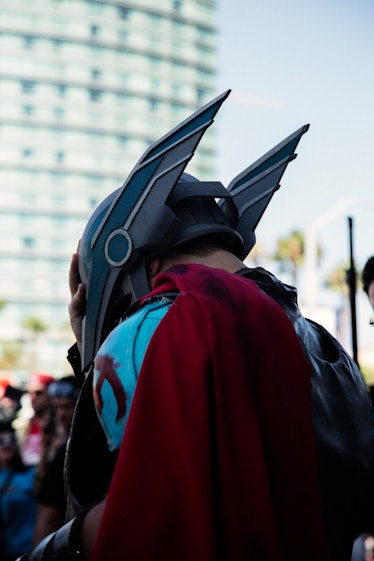 A person wearing a comic book-inspired costume at the 2017 Comic-Con International, held in San Dieg...