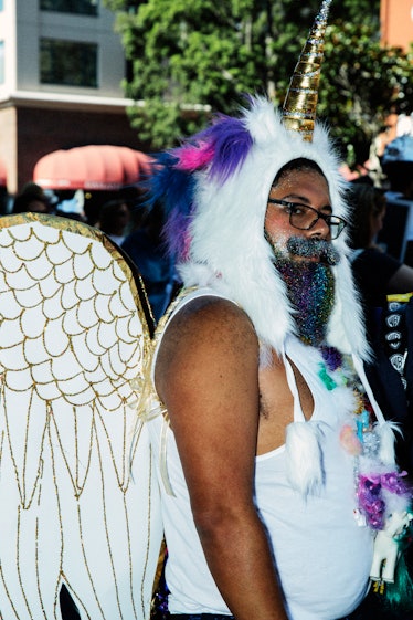 A man wearing a costume with wings at the 2017 Comic-Con International, held in San Diego
