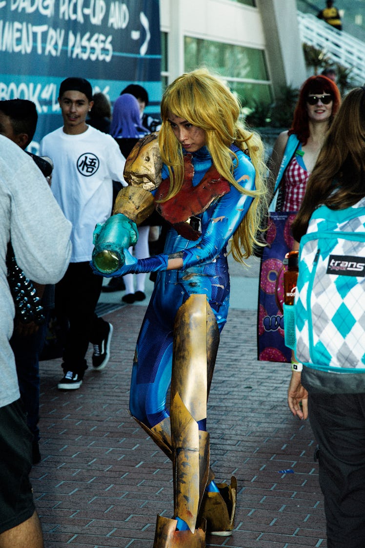 A woman in a blue costume at the 2017 Comic-Con International, held in San Diego
