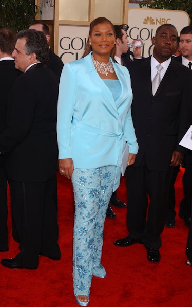 Queen Latifah wearing a light-blue blazer paired with rhinestone-adorned pants at the 60th Golden Gl...