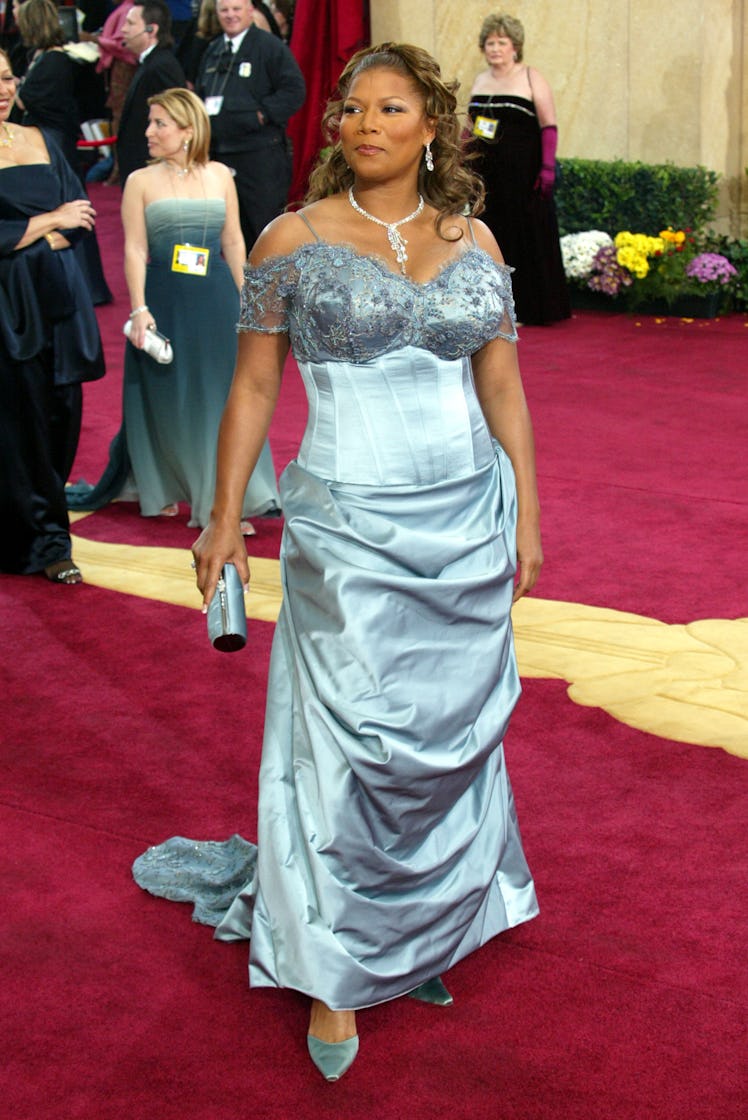 Queen Latifah wearing a light blue satin gown at the 75th Annual Academy Awards red carpet