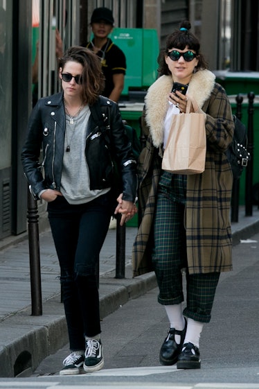 Kristen Steward holding hands with French singer and Gucci-muse Soko.