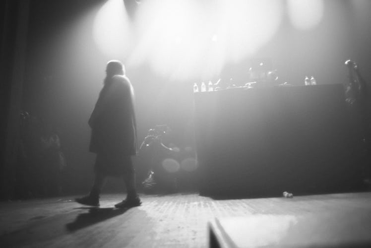 Action Bronson standing on stage during his concert 