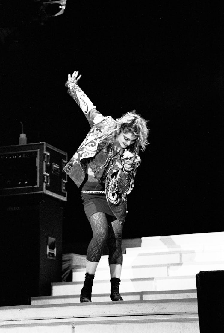 Madonna performing on stage. 