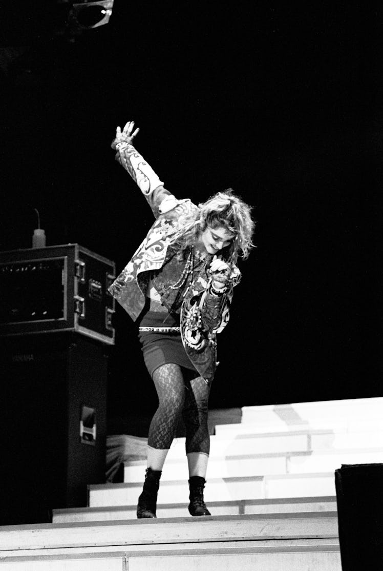 Madonna performing on stage. 