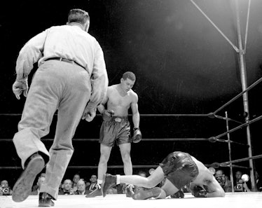 Billy Conn hits the canvas after being hit by punch thrown b