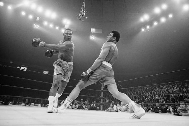 Boxer Ali Dodging a Punch From Frazier