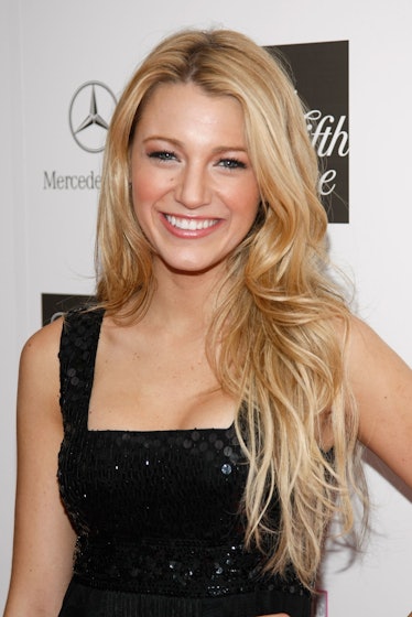 Blake Lively in a black sequin dress wearing a long mermaid waves haircut.