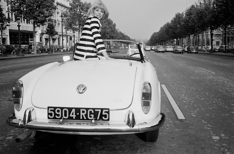 Actress Mireille Darc Driving Convertible