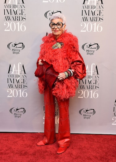 Iris Apfel wearing red